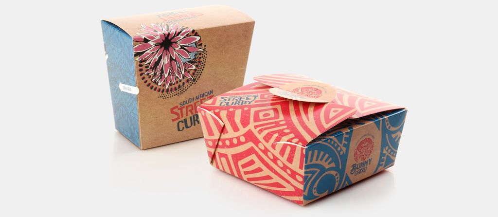 Kemasan makanan bertema Afrika dengan desain etnis dan warna cerah.