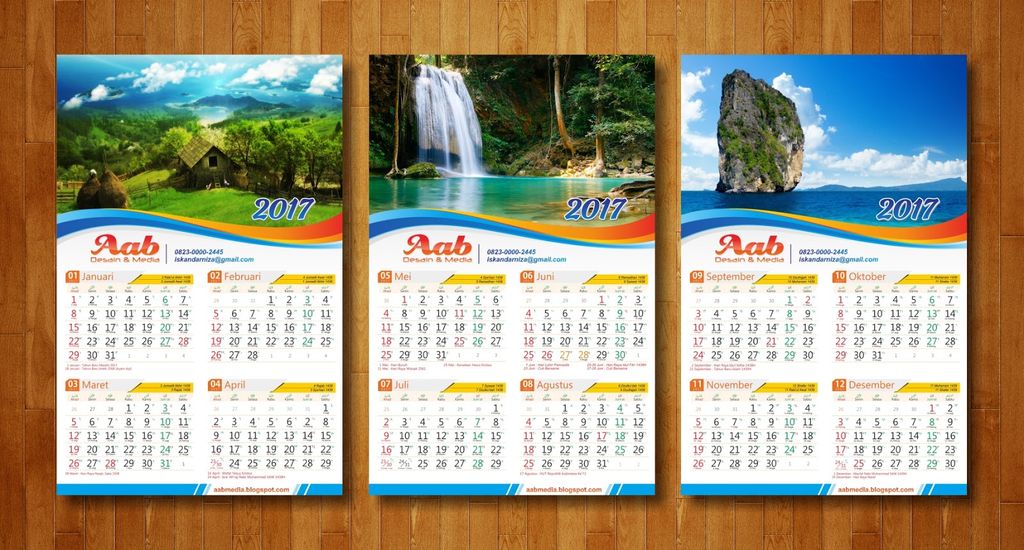 Kalender dinding perusahaan dengan pemandangan alam dan elemen branding yang tampil rapi di area kerja