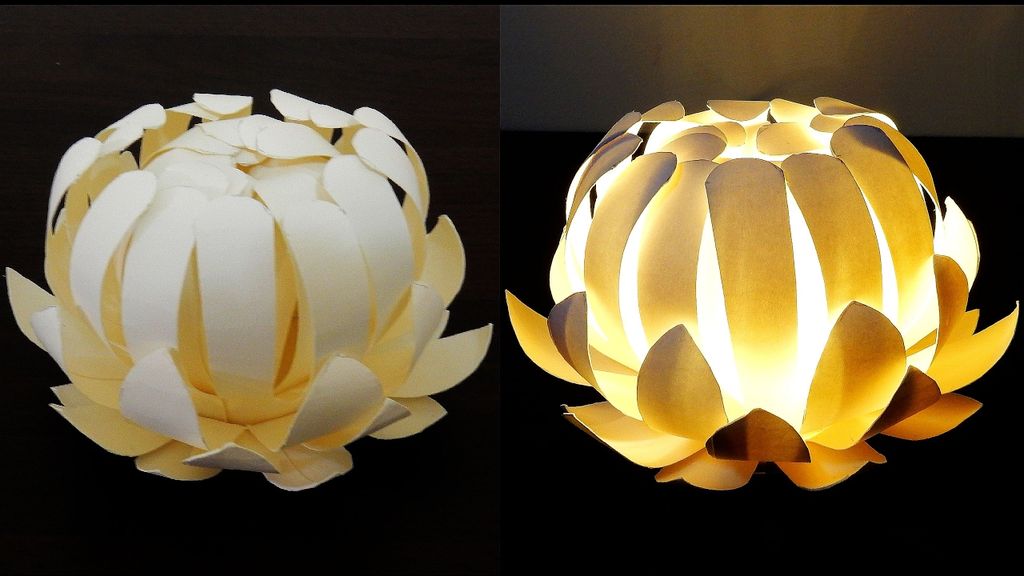 Lampu origami berbentuk bunga lotus, desain unik dan menawan.