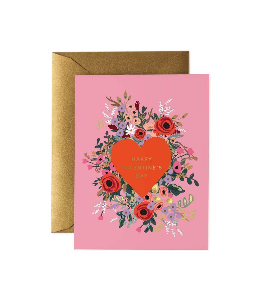 Kartu Valentine berwarna pink dengan hiasan bunga dan tulisan Happy Valentine's Day untuk inspirasi ucapan romantis.