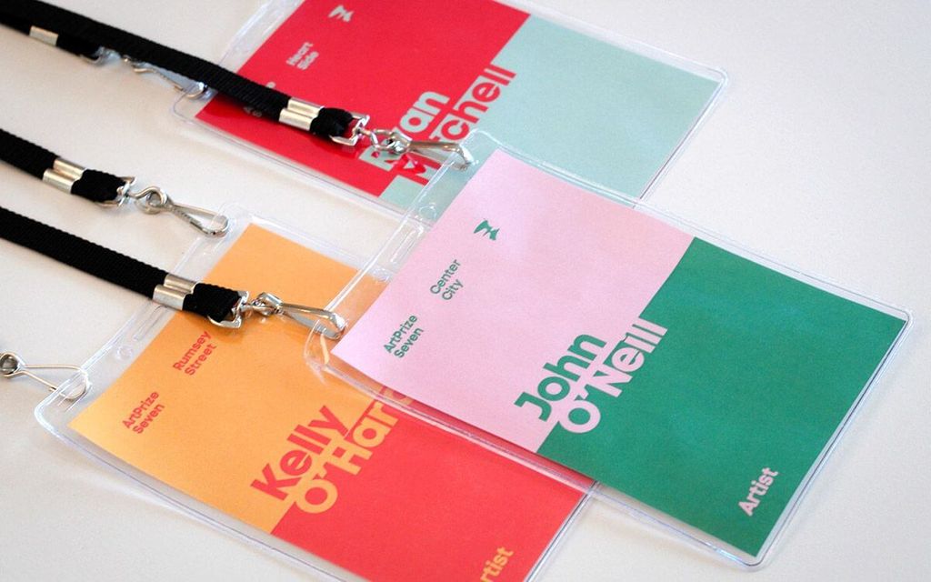 ID cards featuring colorful designs and names for ArtPrize Seven event.