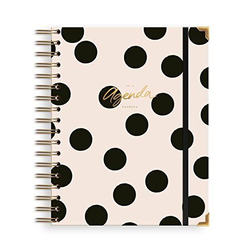 Buku agenda dengan desain polkadot elegan dan spiral.