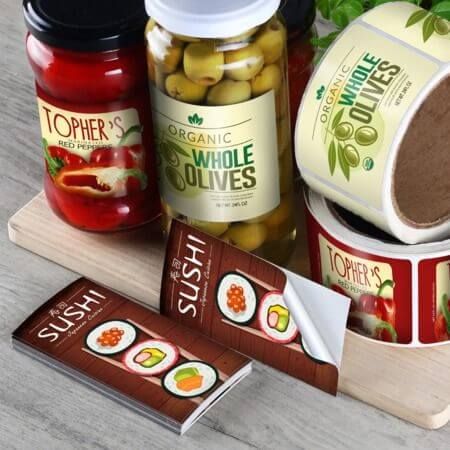 Rangkaian label makanan dan produk percetakan Uprint.id untuk kemasan makanan custom