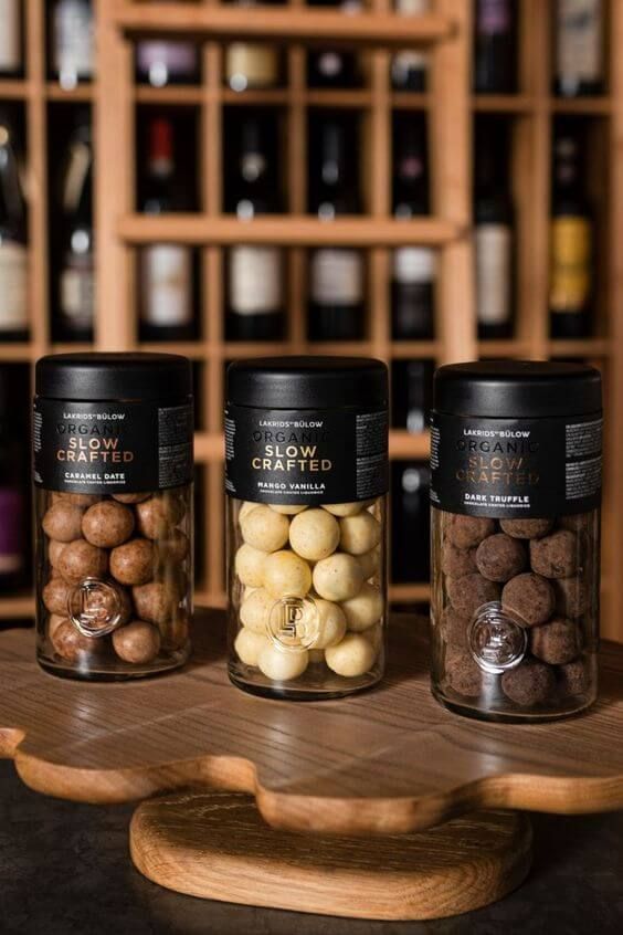 Tiga botol truffle organik slow crafted berbagai rasa.