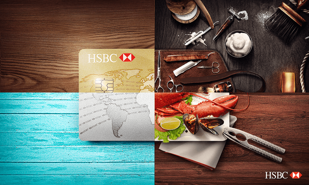 Desain kartu HSBC dengan latar belakang tekstur kayu dan pelangi