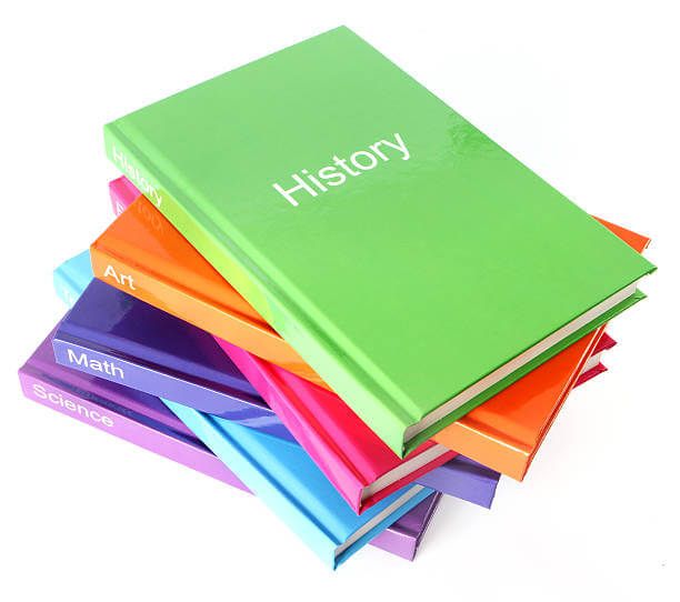 Pile of colorful educational books with 'History' on top.