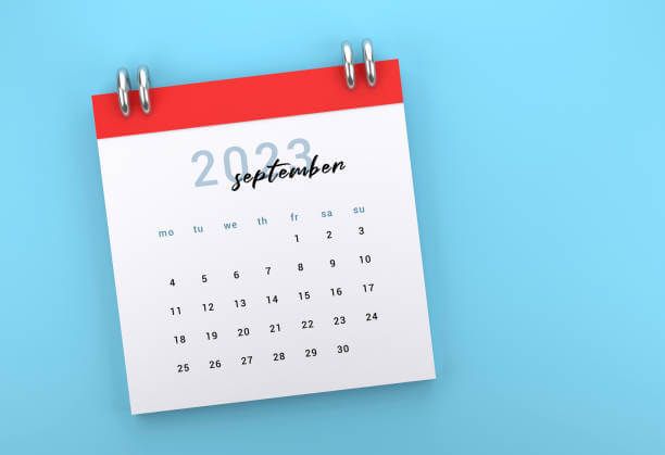 Kalender bulan September 2023 dengan latar biru.