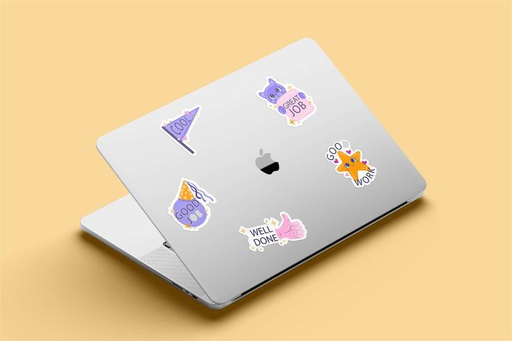 Laptop dengan berbagai stiker desain menarik dan unik.