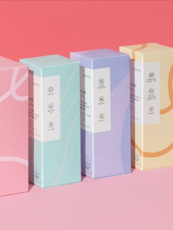 Empat kotak produk Cube Me dengan warna pastel dan logo minimalis.
