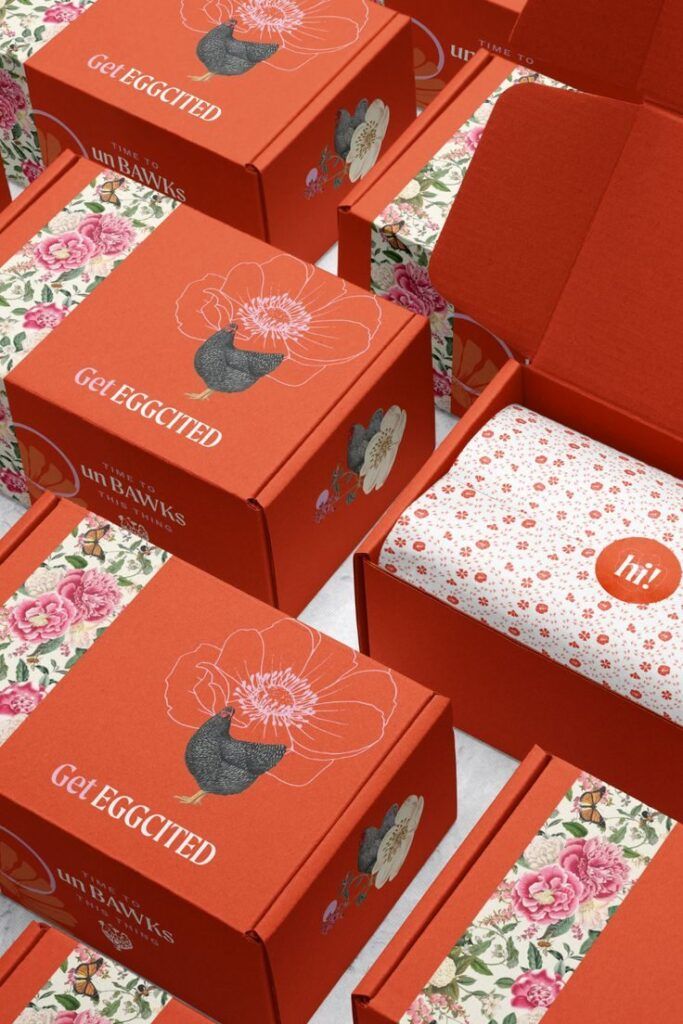 Kotak packaging custom dengan warna brand yang rapi untuk unboxing viral