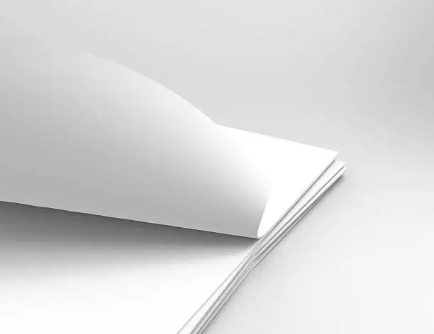 Buku terbuka dengan halaman putih bersih, ideal untuk desain atau cetak.