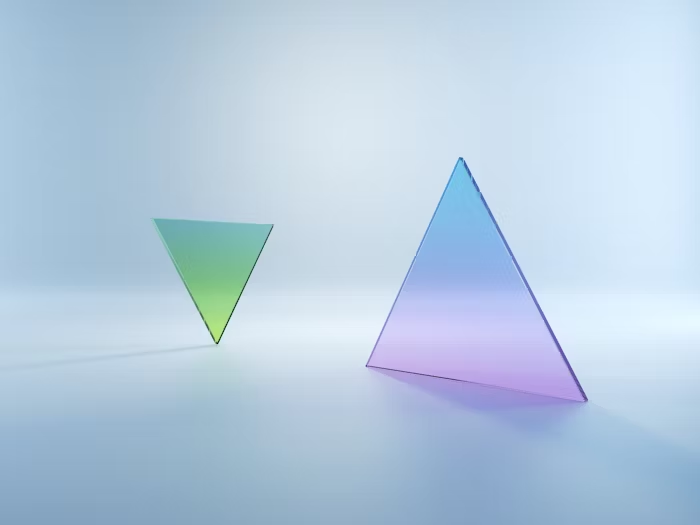 Dua segitiga berwarna transparan dengan gradasi warna, representatif untuk analisis aset visual.