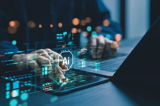 Tangan sedang menggunakan laptop dengan efek grafis hologram AI.
