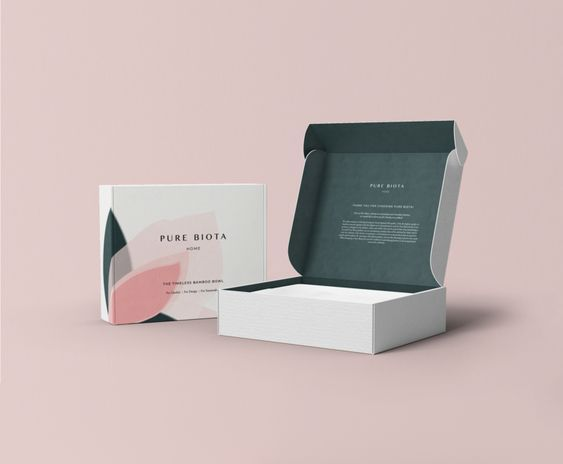 Desain kemasan minimalis untuk merek Pure Biota dengan tampilan bersih dan logo terpusat.