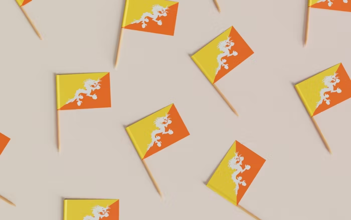 Mini Bendera Bhutan dengan latar belakang putih