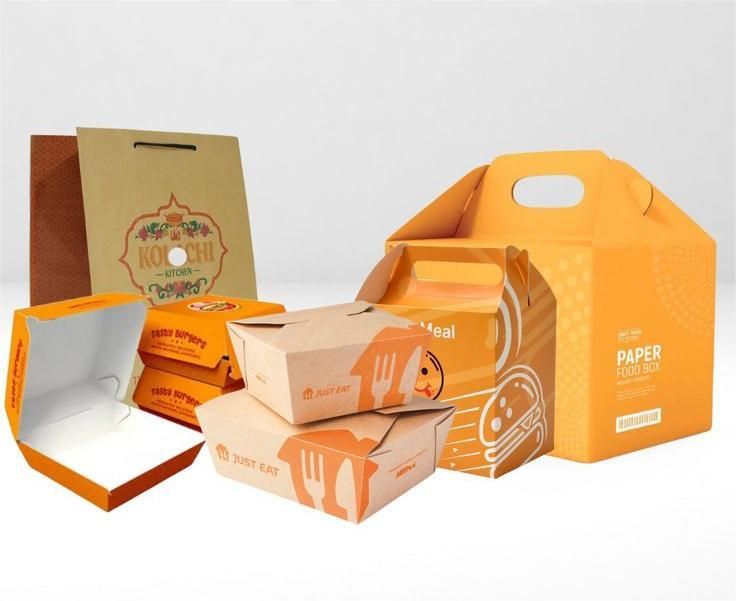 Beberapa kemasan makanan kertas warna oranye dengan logo dan gambar burger.