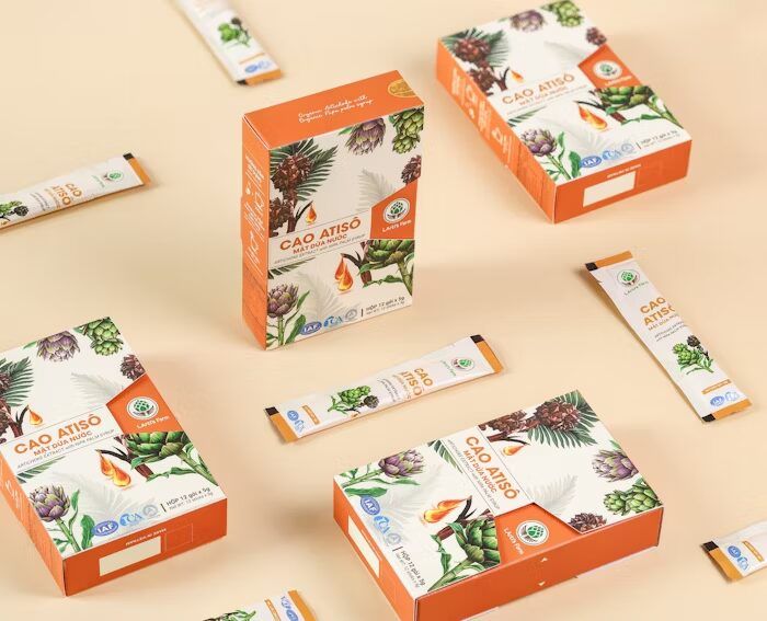 Paket produk Cao Atiso dari Uprint.id, mencakup box dan sachet.