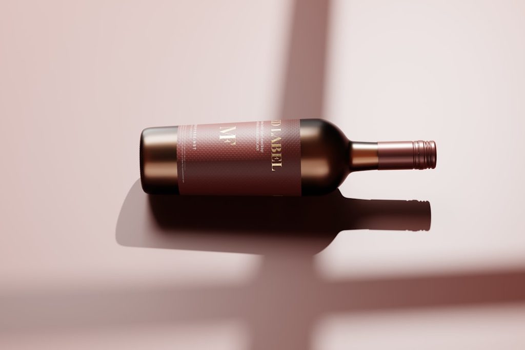 Botol produk dengan label elegan yang menunjukkan pentingnya identitas visual cetak untuk branding startup.