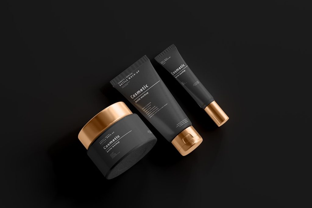 Kemasan kosmetik modern dengan warna hitam dan emas, ideal untuk branding premium.