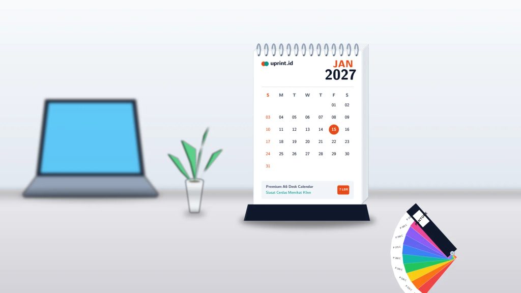 Ilustrasi kalender meja A6 portrait branded 7 lembar Uprint.id di atas meja kerja modern dengan Pantone color guide