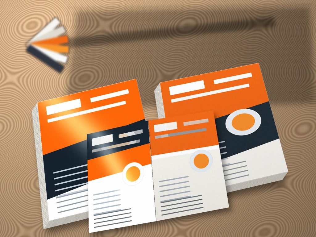 Perbandingan cetak brosur Art Paper mengilap dan Matte Paper doff di meja percetakan.