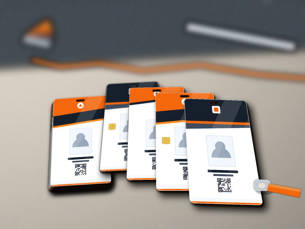 Deretan cetak ID card custom PVC berkualitas dengan hasil presisi dan finishing rapi di meja kerja percetakan.