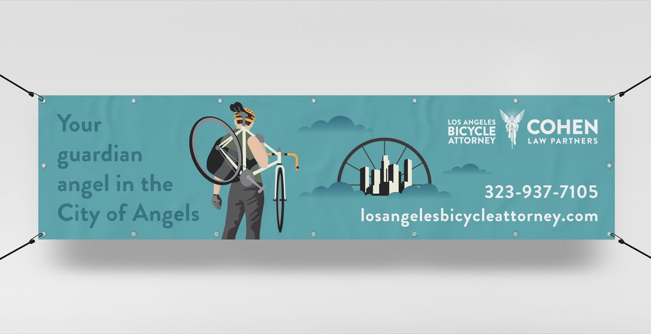 Banner promosi advokat sepeda di Los Angeles dengan tema 'Guardian Angel'.