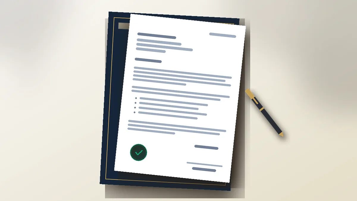 Contoh surat lamaran kerja resmi dengan format benar diletakkan di atas meja studio cetak Uprint.id.