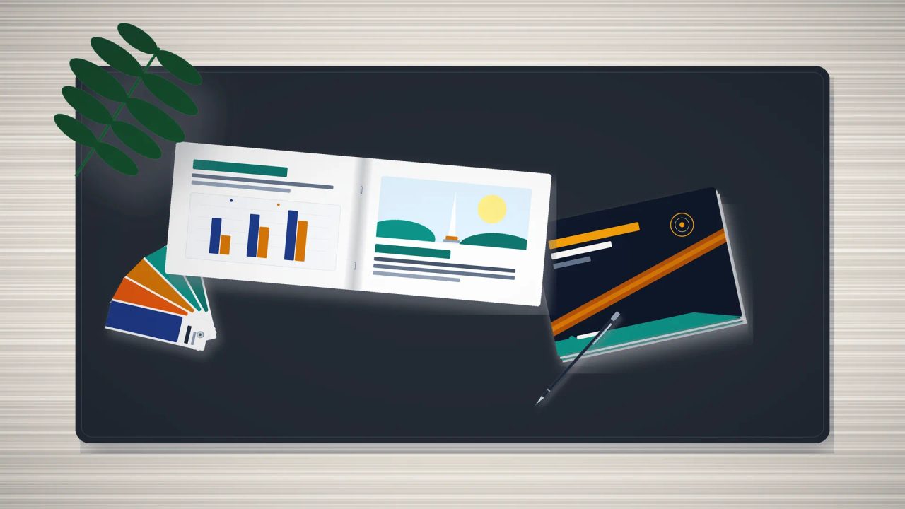 Desain booklet landscape A5 premium dengan grafik promosi di atas meja studio cetak Surabaya.