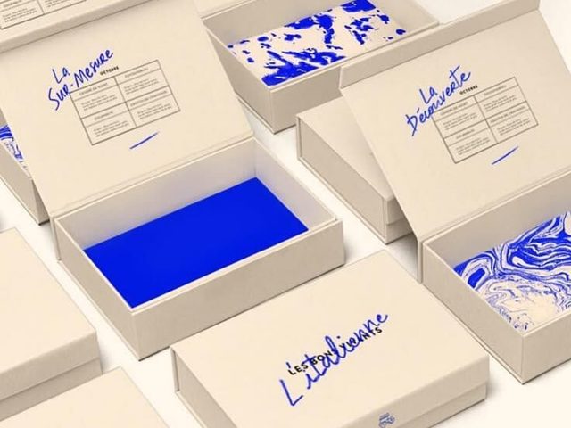 Rangkaian kotak percetakan online dengan desain unik dan warna biru.
