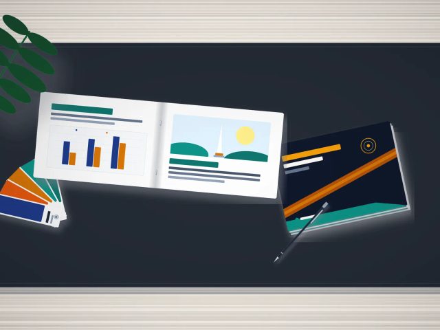 Desain booklet landscape A5 premium dengan grafik promosi di atas meja studio cetak Surabaya.